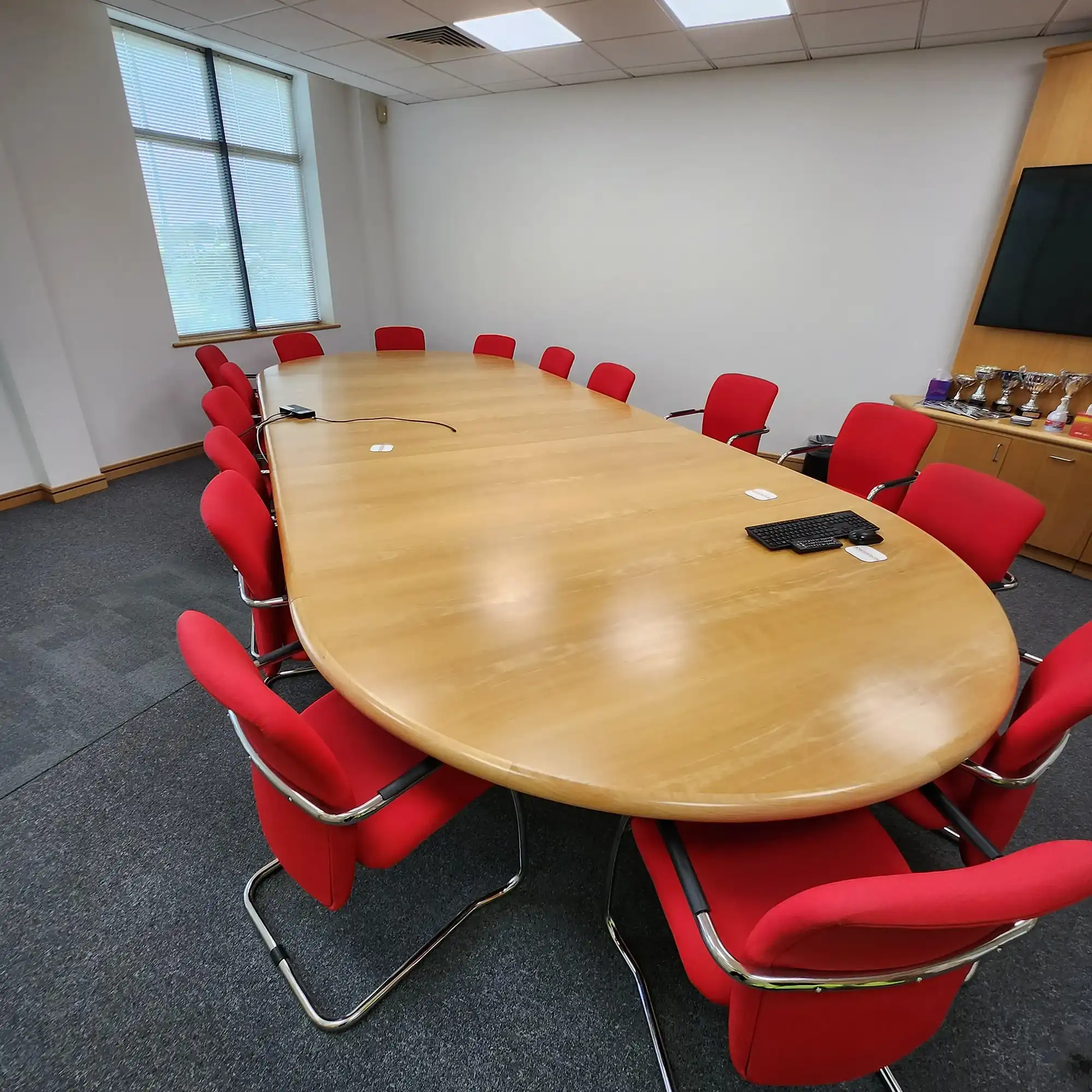 office table with red chairs

